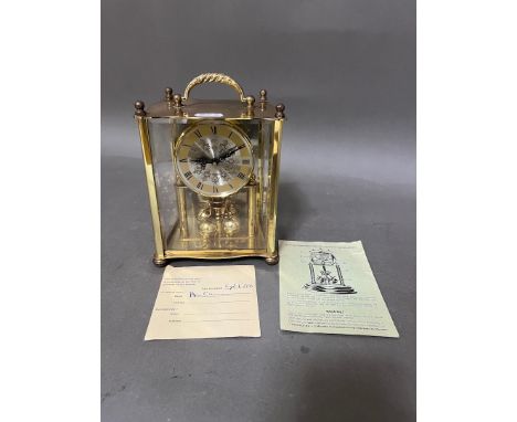 A German Elo revolving pendulum clock. 