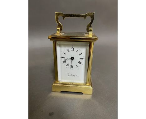 A brass "Wellington" carriage clock. 