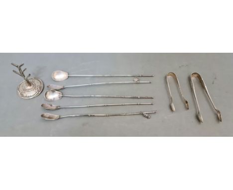 A selection of silver items including 5 Japanese "bamboo" cocktail / tea spoons, two pairs of tongs and a ring tree, gross we