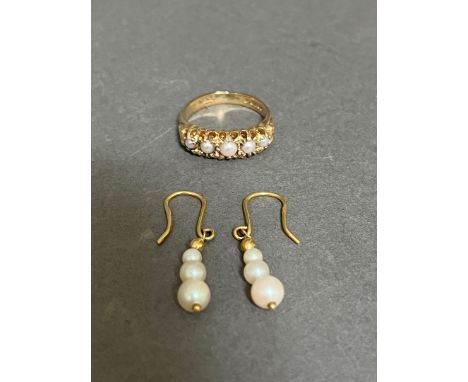 A 9ct gold pearl ring together with a pair of 9ct gold 3 pearl drop earrings. 