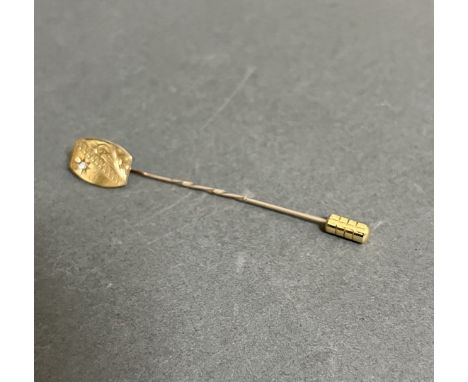 A hallmarked 9ct gold diamond stick pin, wt. 1g. 