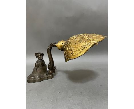 A vintage "Scotsman Tam O Shanter" cast metal adjustable table lamp with gilt brass "sconce" type shade. 