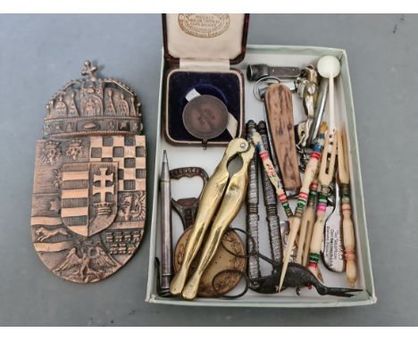 A small box of bric a brac including sports medals, penknives, propelling pencil etc 