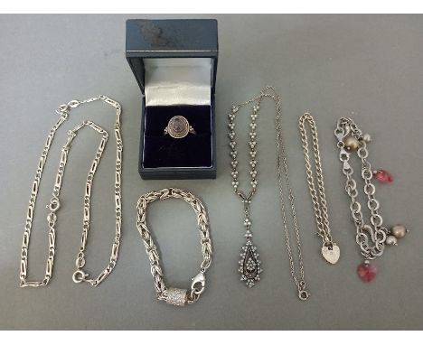 A vintage pearls and silver necklace, a silver ring, 3 silver bracelets and a silver chain, gross weight approx 70 grams. 