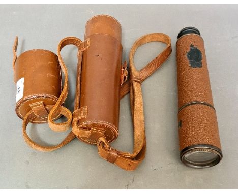 A WW2 snipers scout regiment telescope in leather case, inscribed TEL.SCT.REGT.MK.2.S. K.E.C. O.S. 126 G.A. 21762. 