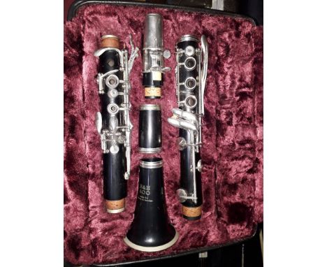 A Boosey &amp; Hawkes 400 clarinet in hard case. 