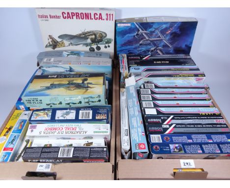 Aviation model kits in two boxes    Condition Report  Appear to be complete, but it's a possibility that some pieces may be m