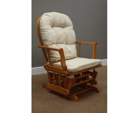 Beech framed hoop and stick back rocking armchair with upholstered loose cushions   Condition Report   Click here for further