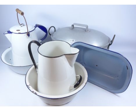 Two large enamel jugs, similar bowls, roasting tin and a large aluminium 'Swan Brand' fish kettle    Condition Report   Click