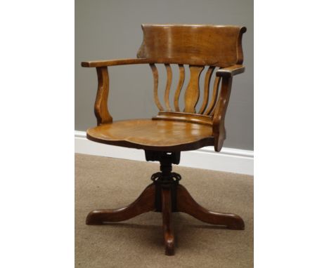 Early 20th century golden oak swivel office desk chair, serpentine stick and splat back, W62cm   Condition Report   Click her