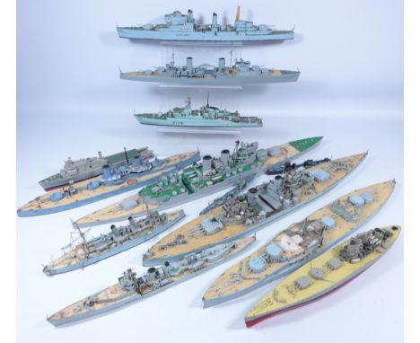 Collection of wooden model Naval ships, including King George V, The Dreadnought and other model ships (13)   Condition Repor