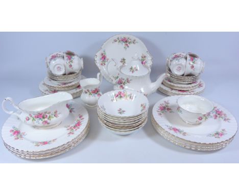 Royal Albert 'Moss Rose' pattern tea and dinnerware, eight place settings   Condition Report  The gravy boat has a chip to th