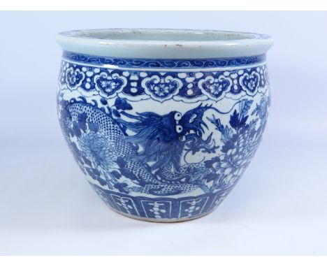19th/ early 20th Century Chinese blue and white jardiniere hand decorated with dragons and blossom, D31cm Condition Report No