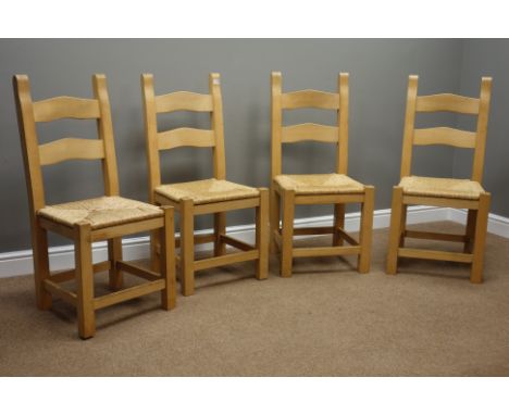 Set four solid beech ladder back kitchen chairs with rush seats   Condition Report   Click here for further images, condition