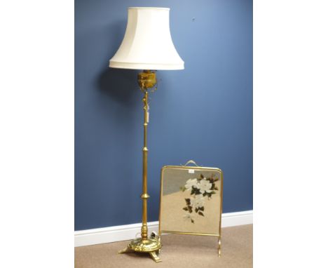 Early 20th century brass oil standard lamp (H150cm), and a brass and mirrored fire screen   Condition Report   Click here for
