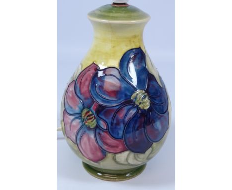Moorcroft Anemone pattern table lamp, H20.5cm excluding fitting    Condition Report  Light crazing, otherwise good condition.