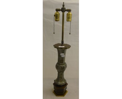 A Chinese pewter lamp