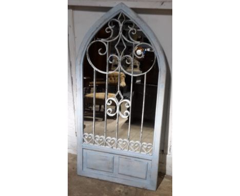 A blue arch mirror
