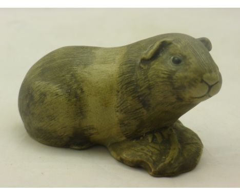 A Poole pottery model of a guinea pig