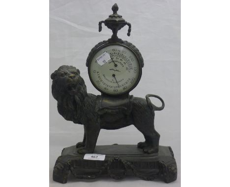 A bronze lion barometer