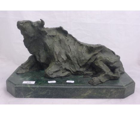 An abstract bronze model of a bull