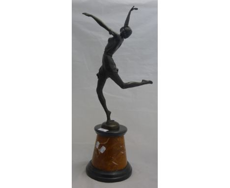 An Art Deco style bronze figure of a dancing girl