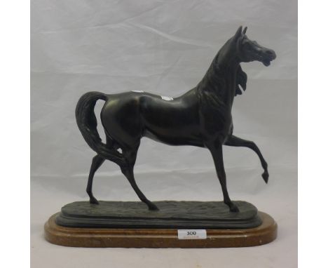 A bronze model of a horse