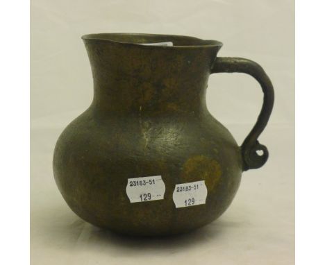 A patinated bronze jug 