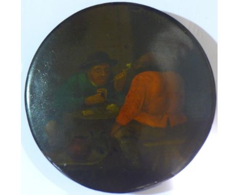 A 19th century papier mache snuff box decorated with figures in a tavern interior