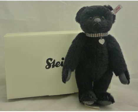 A modern boxed Steiff mohair teddy bear