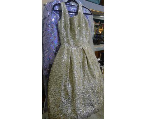 A quantity of vintage and designer ladies clothing