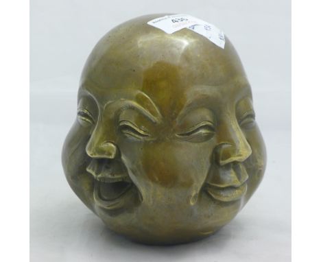 A four face bronze Buddha