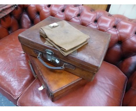 THREE VINTAGE LEATHER CASES.