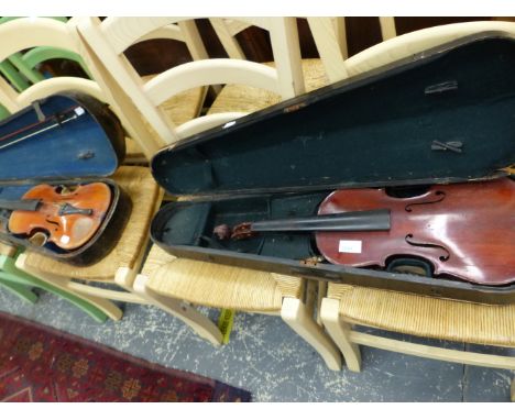 TWO VINTAGE VIOLINS IN CASE.