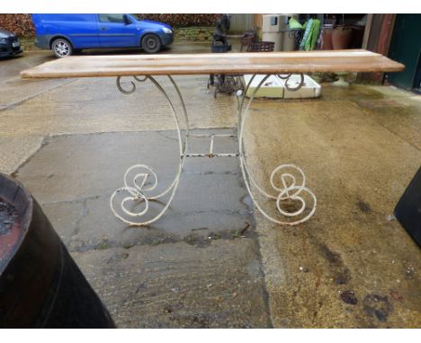 A CONSOLE TABLE WITH PAINTED WROUGHT IRON BASE.