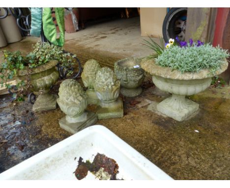 THREE MATCHING COMPOSITE GATE POST FINIALS TOGETHER WITH THREE COMPOSITE GARDEN URNS.
