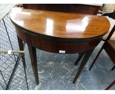 A GEORGE III MAHOGANY FOLDOVER CARD TABLE.