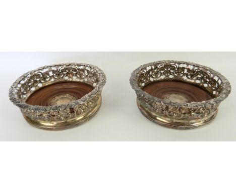 Victorian silver pair of wine coasters, by Joseph Angell I &amp; Joseph Angell II, London, date letter indistinct, the border