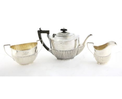 Edward VII silver three piece tea service, comprising tea pot, cream jug and sugar bowl, by Jones &amp; Crompton, Birmingham,