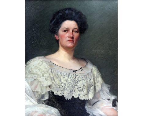 Early 20th century British School, half-length portrait of a woman with dark hair, unsigned, oil on canvas, 71cm x 57cm..    