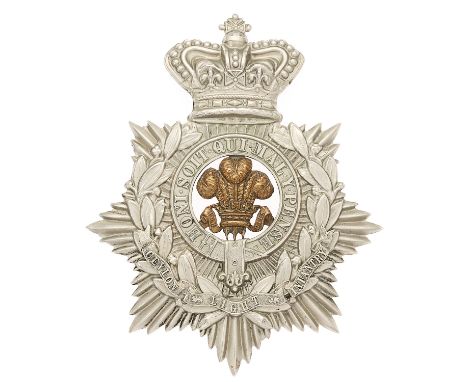 Ceylon Light Infantry Victorian foreign service helmet plate.  A good rare die-stamped white metal crowned star bearing Garte