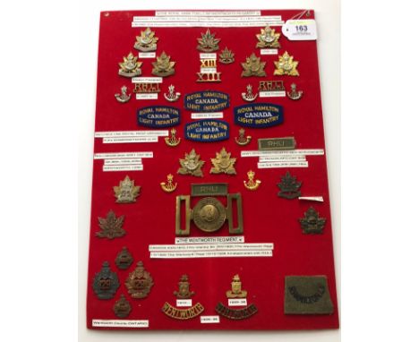 Canada. Royal Hamilton Light Infantry/Wentworth Regiment 42 items of insignia.  Board with good  display of metal and cloth b