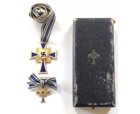 German Third Reich. 1st class Cross of Honour of the German Mother in case of issue with miniature.  A fine gilt example with