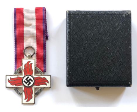 German Third Reich cased Fire Brigade Decoration 2nd Class.  A good die-cast example. The arms in white enamel with red ename