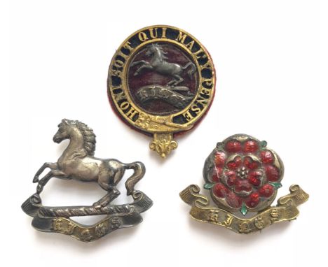 Kings Liverpool Regiment Victorian Officers post 1881 forage cap badge.  Good scarce gilt pierced Garter on a blue velvet; cr