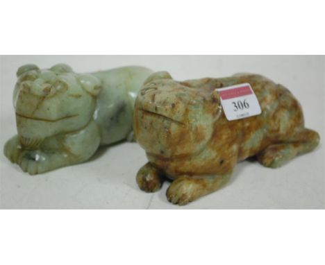 Two mid-20th century carved russett jade Shishi dogs (2)
