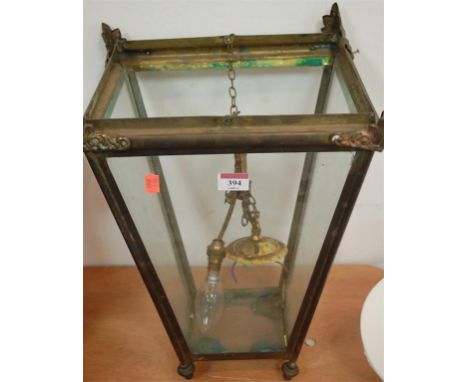 An early 20th century lacquered brass hanging lantern