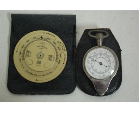 A cased French cartographer's gauge measuring centimetres to kilometres and inches to miles, and a modern brass pocket barome
