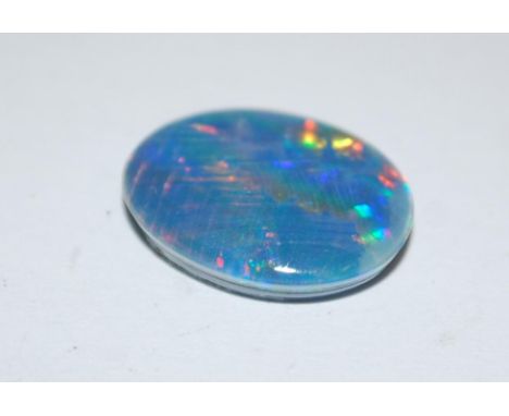 A loose oval cut opal 