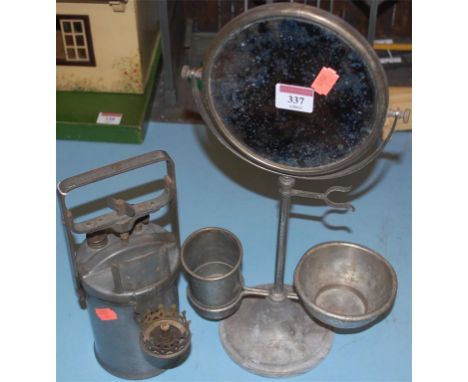 An early 20th century metal table-top shaving stand; together with the Premier Lamp Crestella (2)